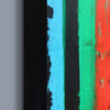 Side view close-up of a colourful abstract painted surface with vertical brushstrokes in black, bright cyan, green, and red, alongside a grey vertical area on the left.