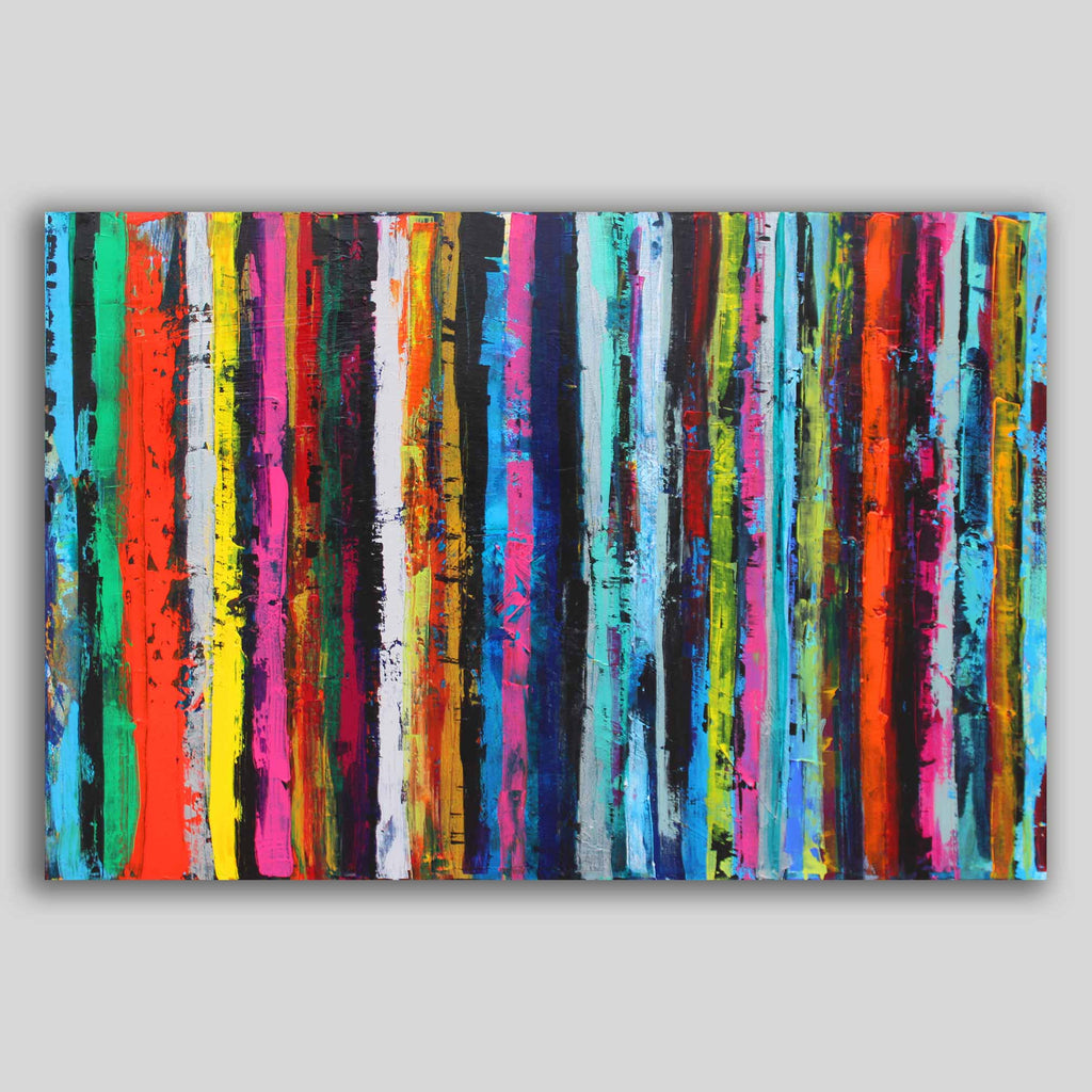 A colourful abstract canvas wall art painting featuring vertical textured paint strokes in a rainbow of vibrant colours including blue, pink, red, orange, yellow, green, and black, shown against a neutral grey background.
