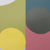 Abstract geometric wall art featuring overlapping circles in yellow, dark gray, and pink over a split background of olive green and teal.