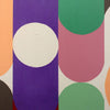 Close up detail of abstract geometric wall art featuring bold painted shapes including a large white oval on a purple vertical panel, a pink arch on a white background, green arches, and peach sections.