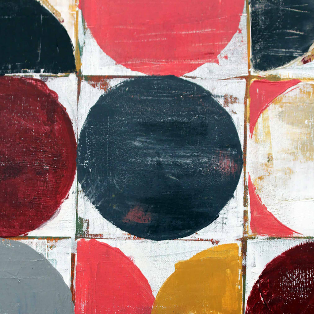 Abstract geometric painting featuring bold painted circles and arcs in red, black, white, yellow, and gray on a textured grid background.