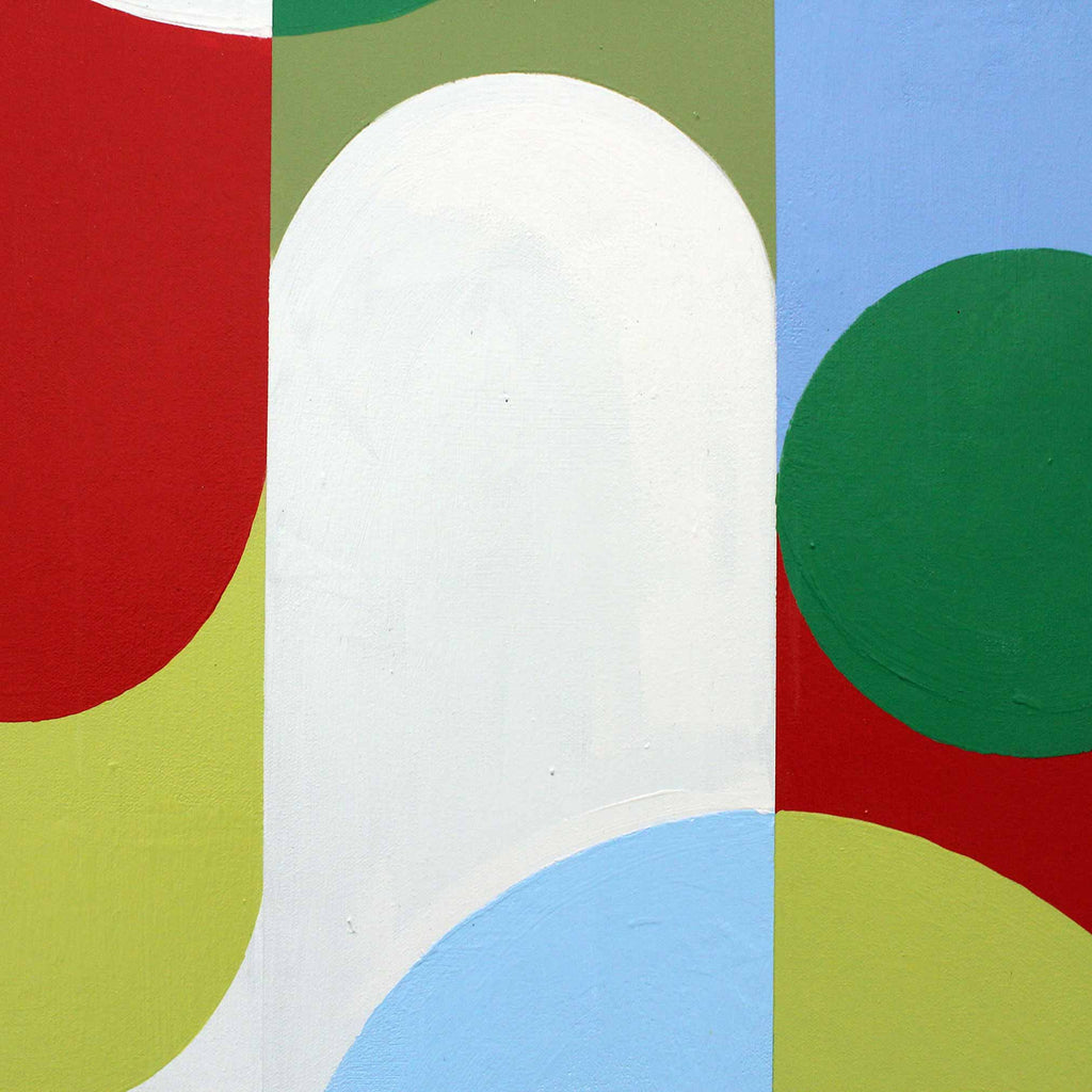 Close up detail of abstract geometric wall art painting featuring bold curved and circular shapes in red, white, blue, green, and yellow-green.