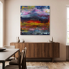 Flamingo Sunset - A colourful abstract canvas painting hangs on a beige wall above a mid-century modern wooden credenza in a dining room setting.