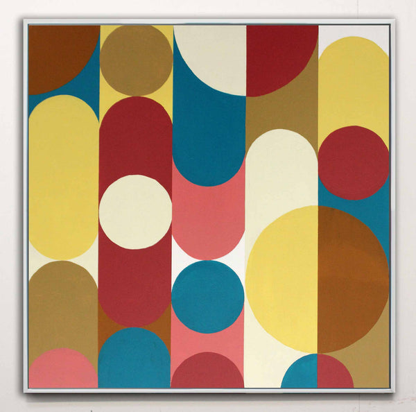 A square framed abstract geometric wall art painting featuring overlapping vertical and circular shapes in mustard yellow, teal blue, rust red, cream, tan, and brown on a white background.