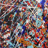 Close up detailed image of abstract splatter painting Kinetic Flow showing energetic drips and splashes of red, blue, light blue, black, white, and tan across the full frame.