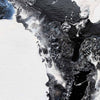 Orbital a close up detail image of abstract black, white, and grey fluid art painting with textured brushstrokes and marbled patterns by artist Andy Watt.