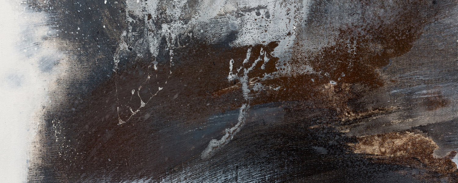 Abstract textured close up background with expressive brushstrokes in black, charcoal grey, white, and warm brown tones.
